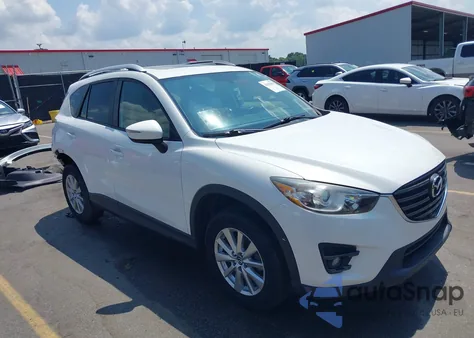 2016 Mazda Cx-5 Touring z USA, uszkodzony, nr VIN JM3KE2CY5G0677246